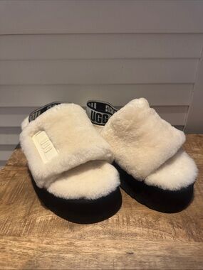 UGG Cream Shearling Slide Sandals with Black Sole